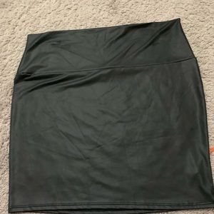 A stretchy black mini skirt